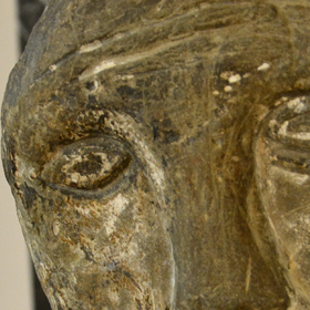 granitowa głowa bóstwa pogańskiego z XII wieku